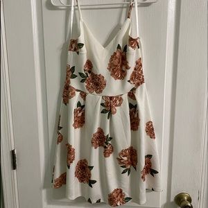 Monteau Spaghetti strap, flower dress with pleated skirt.